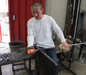 3. Working in the bench and shape the glass.